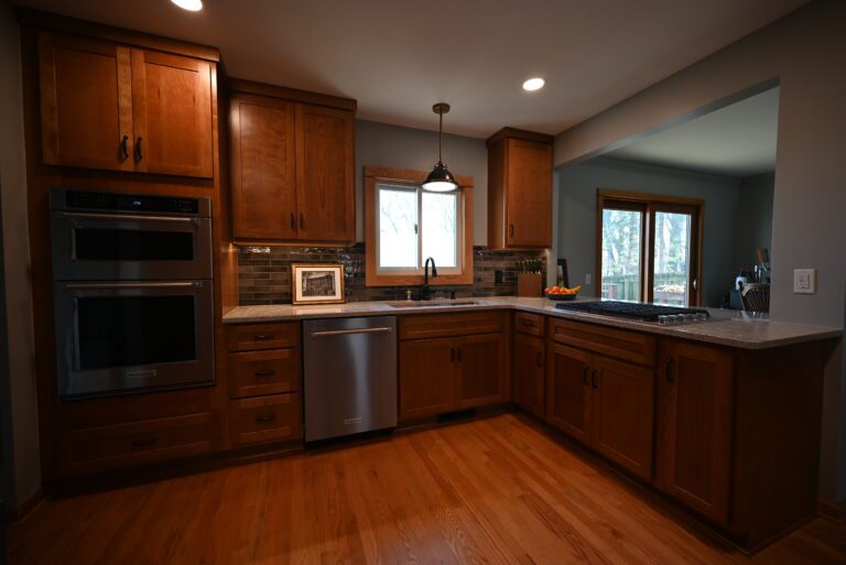 Warm wood kitchen with granite counters