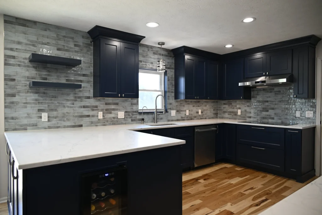 01-navy-kitchen-quartz-waterfall-peninsula