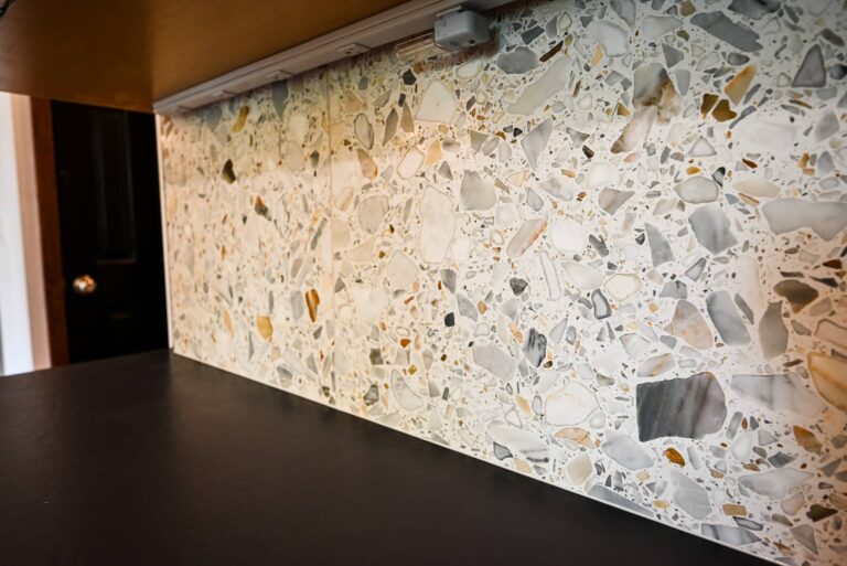 Stone accent wall detail in a renovated kitchen