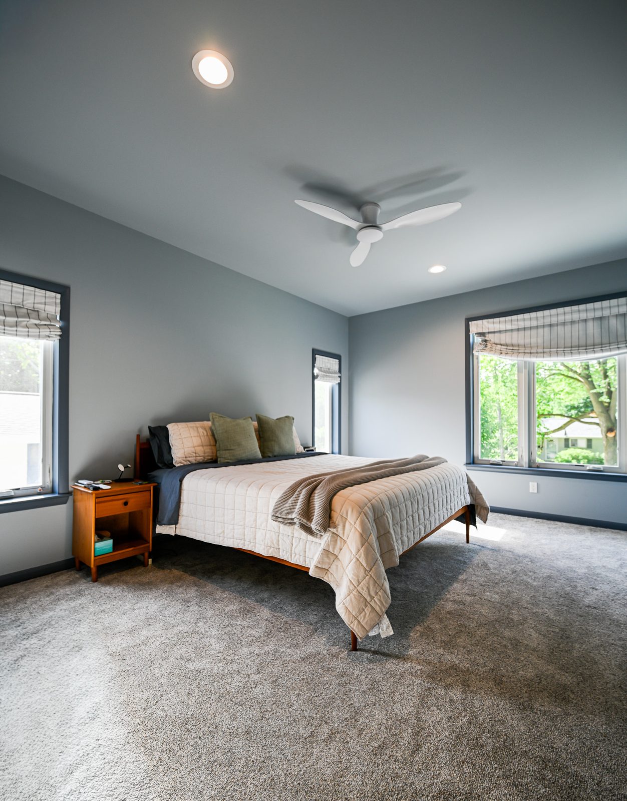 Guest bedroom with a vaulted ceiling in the Ann Arbor garage-top addition