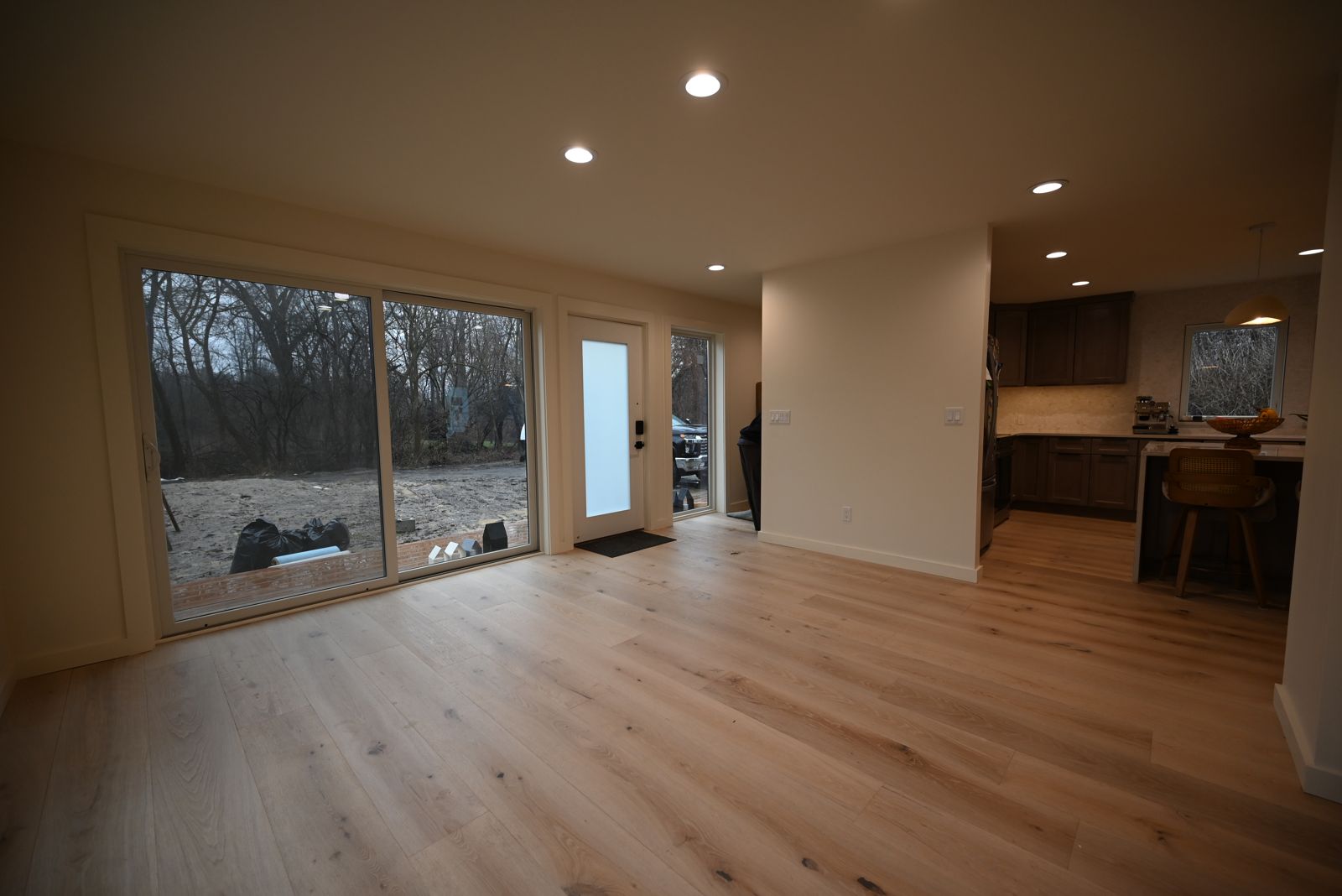 Bright great room opening to the backyard in the finished Ann Arbor home