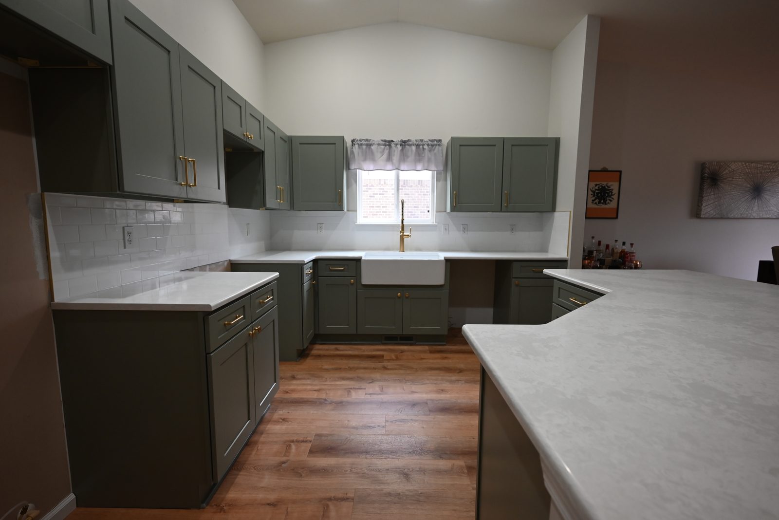 Full view of remodeled Belleville kitchen showing new flooring and cabinetry