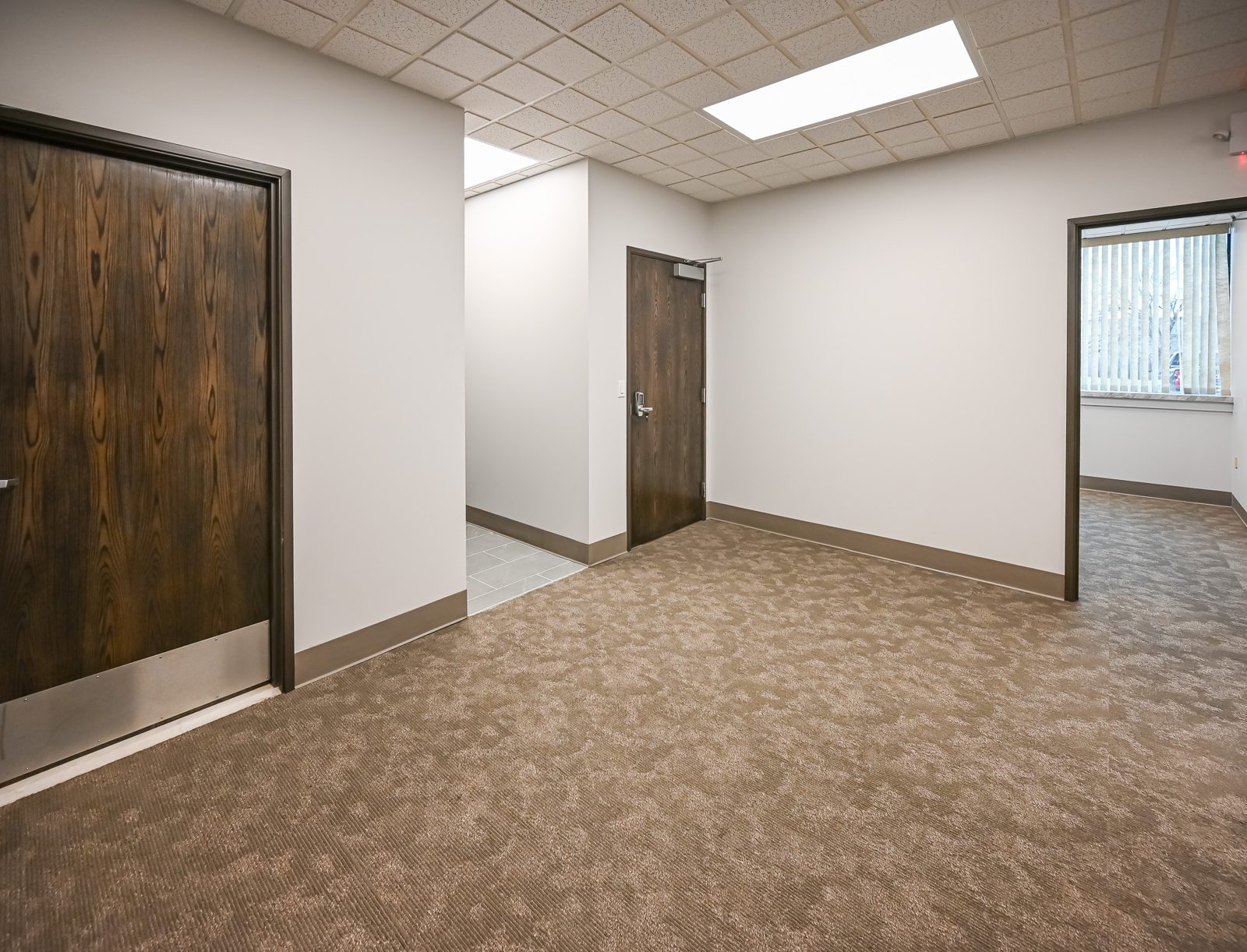 Updated offices and corridor in the renovated Troy title company office