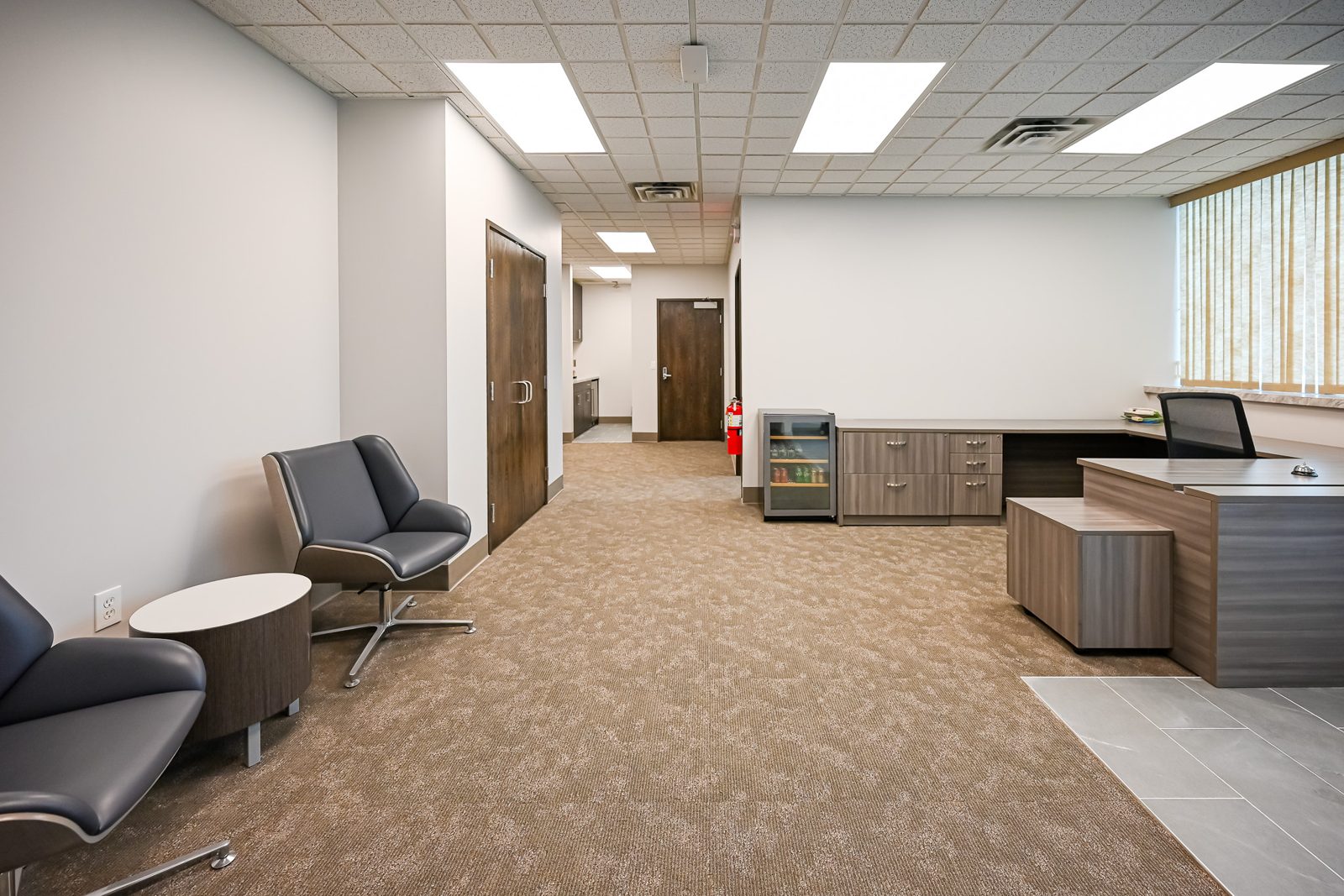 Client waiting area with new finishes in the Stewart Title Troy office
