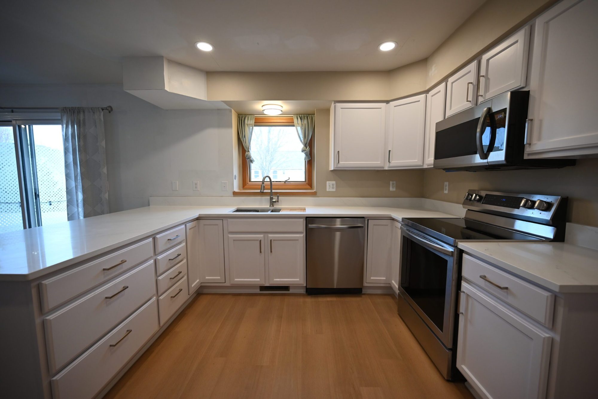 Updated kitchen with new appliances and task lighting in Ypsilanti