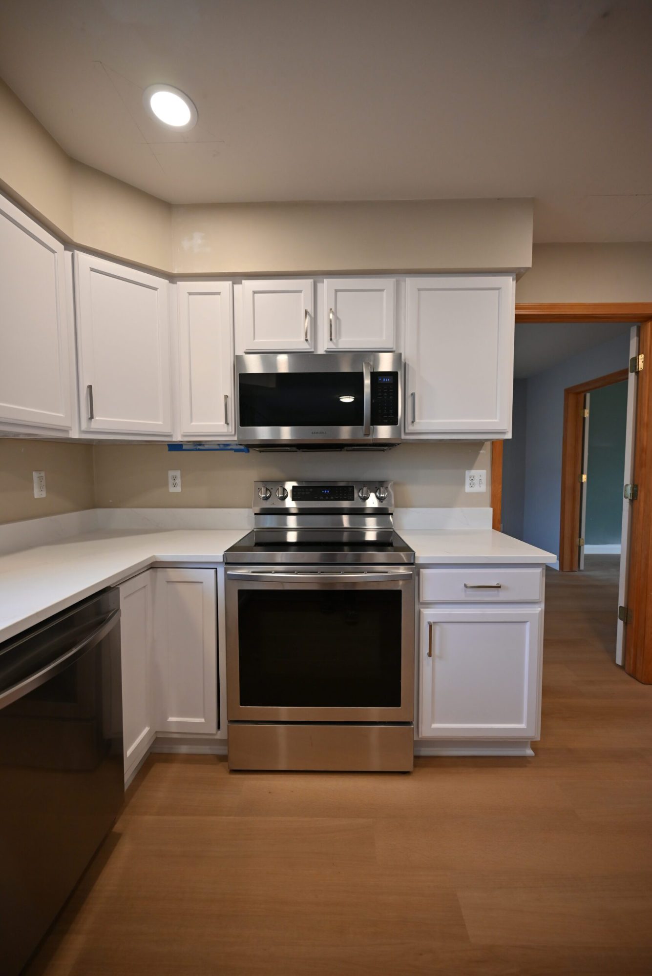 Finished kitchen remodel in Ypsilanti with new cabinetry, counters and lighting