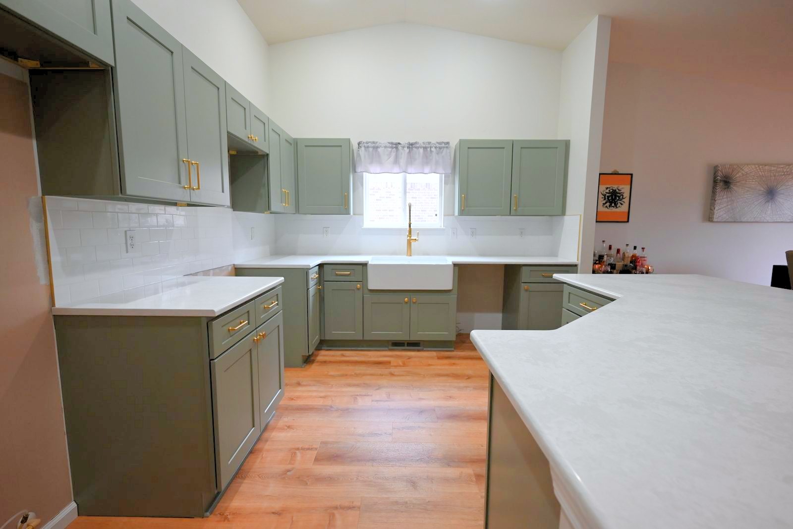 Full view of remodeled Belleville kitchen showing new flooring and cabinetry