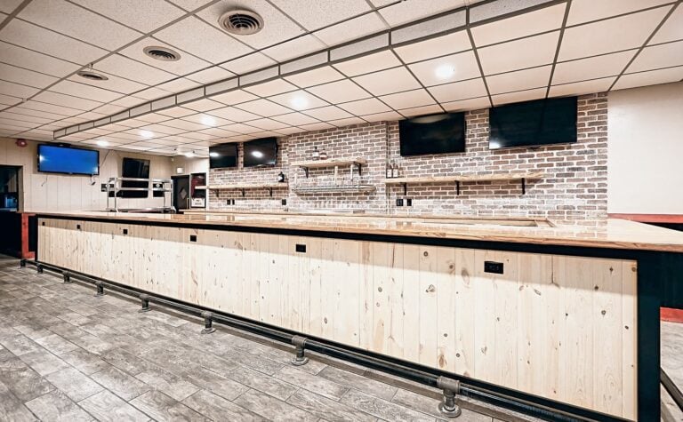 Remodeled bar at 342 Bar and Grill in Dearborn Heights with a knotty pine front, butcher block top and brick back bar